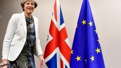 FILE PHOTO: Britain's Prime Minister Theresa May arrives for a meeting with European Council President Donald Tusk at a European Union leaders summit in Brussels, Belgium October 20, 2017. REUTERS/Geert Vanden Wijngaert/Pool/File Photo