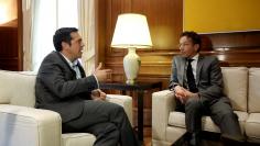 FILE PHOTO: Greek Prime Minister Alexis Tsipras meets with Dutch Finance Minister and Eurogroup President Jeroen Dijsselbloem at his office in the Maximos Mansion in Athens, Greece September 25, 2017. REUTERS/Alkis Konstantinidis