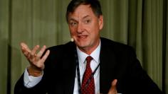 FILE PHOTO: Federal Reserve Bank of Chicago President Charles Evans participates in a moderated discussion in Zurich, Switzerland October 11, 2017. REUTERS/Arnd Wiegmann 