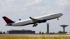 A Delta Air Lines Airbus A330 aircraft takes off at the Charles de Gaulle airport in Roissy