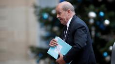 French Foreign Affairs Minister Jean-Yves Le Drian arrives at the Elysee Palace in Paris