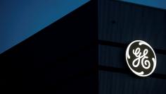 FILE PHOTO: The General Electric logo is pictured on the General Electric offshore wind turbine plant in Montoir-de-Bretagne, near Saint-Nazaire, western France, November 21, 2016. REUTERS/Stephane Mahe/File Photo        