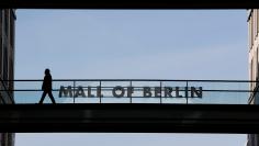 FILE PHOTO: A man walks at the LP12 Mall of Berlin shopping mall is in Berlin, Germany, March 3, 2017.     REUTERS/Fabrizio Bensch/File Photo