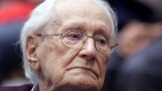 FILE PHOTO: Oskar Groening, defendant and former Nazi SS officer dubbed the "bookkeeper of Auschwitz", is pictured in the courtroom during his trial in July 2015