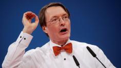 Karl Lauterbach speaks during the SPD's one-day party congress in Bonn, Germany, January 21, 2018. REUTERS/Wolfgang Rattay