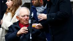 German Chancellor Merkel and Bundestag's President Schaeuble attend the inauguration of memorial at the site of last year's truck attack in a Christmas market at Breitscheidplatz square in Berlin