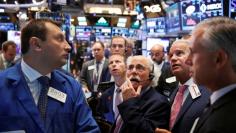 Traders work on the floor of the New York Stock Exchange (NYSE) shortly after the opening bell in New York, U.S., August 30, 2016.  REUTERS/Lucas Jackson/File Photo 