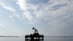 An oil pump jack of Canadian group Vermilion Energy is pictured in Parentis-en-Born, France, October 13, 2017.   REUTERS/Regis Duvignau  