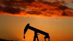 FILE PHOTO:  A oil pump is seen at sunset outside Scheibenhard, near Strasbourg, France, October 6, 2017 .   REUTERS/Christian Hartmann 