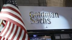 FILE PHOTO: A view of the Goldman Sachs stall on the floor of the New York Stock Exchange July 16, 2013. REUTERS/Brendan McDermid 