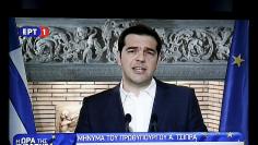 Greek Prime Minister Alexis Tsipras is seen on a television monitor whille addressing the nation early June 27, 2015. REUTERS/Pool