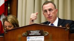 FILE PHOTO - U.S. Representative Tim Murphy (R-PA) chairs a House Energy and Commerce Oversight and Investigations Subcommittee hearing on the U.S. response to the Ebola crisis, in Washington October 16, 2014.  REUTERS/Jonathan Ernst