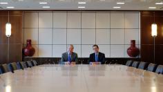 Tom Hill (L), Chairman of Blackstone Alternative Asset Management, and John McCormick, President and CEO of Blackstone Alternative Asset Management, pose for a portrait in New York