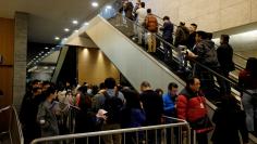 Buyers and property agents line up for developer Sun Hung Kai's property sales in Hong Kong January 13, 2018.  REUTERS/Bobby Yip