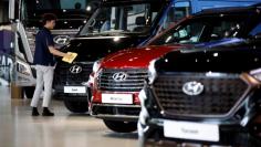 FILE PHOTO: Hyundai Motor's vehicles are displayed at a Hyundai Motorstudio in Goyang, South Korea May 29, 2017. REUTERS/Kim Hong-Ji 