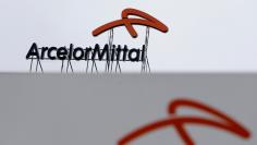 FILE PHOTO: A logo is seen on the roof of the ArcelorMittal steelworks headquarters in Ostrava