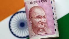 FILE PHOTO: An India Rupee note is seen in this illustration photo June 1, 2017. REUTERS/Thomas White/Illustration/File Photo              