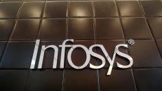 FILE PHOTO: The logo of Infosys is pictured inside the company's headquarters in Bengaluru