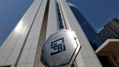 FILE PHOTO: The logo of the Securities and Exchange Board of India (SEBI) is pictured on the premises of its headquarters in Mumbai