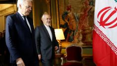 Belgian Foreign Minister Didier Reynders welcomes Iran's counterpart Mohammad Javad Zarif at the Egmont Palace in Brussels, Belgium January 11, 2018. REUTERS/Francois Lenoir