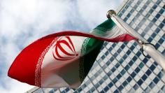 An Iranian flag flutters in front of the United Nations headquarters, during an International Atomic Energy Agency (IAEA) board of governors meeting, in Vienna, March 4, 2015.  REUTERS/Heinz-Peter Bader