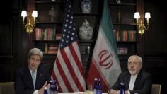 U.S. Secretary of State John Kerry (L) meets with Iran's Foreign Minister Mohammad Javad Zarif in Manhattan, New York City, U.S., April 22, 2016.  REUTERS/Brendan McDermid