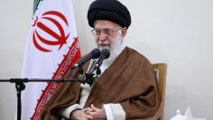 Iran's Supreme Leader Ayatollah Ali Khamenei speaks as he meets with Iranian President Hassan Rouhani and other officials following an earthquake that hit Kermansheh province, in Tehran