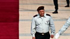 FILE PHOTO: New Israeli Chief of Staff Lieutenant-General Gadi Eizenkot smiles during a handover ceremony, in which he replaced Lieutenant-General Benny Gantz, at Kirya base in Tel Aviv, Israel February 16, 2015. REUTERS/Nir Elias/File Photo