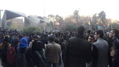 People protest near the university of Tehran