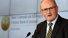 FILE PHOTO - Governor of the Central Bank of Ireland Philip R. Lane speaks at open the new Central Bank of Ireland offices in Dublin, Ireland April 24, 2017. REUTERS/Clodagh Kilcoyne