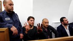 Three Turkish tourist whom Israeli authorities have arrested in Jerusalem over an incident that followed Muslim prayers at a flashpoint holy site according to a police spokesman, gesture at court in Jerusalem