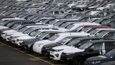 FILE PHOTO: New Land Rover cars are seen in a parking lot at the Jaguar Land Rover plant at Halewood in Liverpool, northern England.