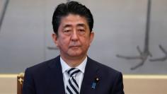 Japan's Prime Minister Shinzo Abe attends a meeting of the Imperial Household Council to discuss the timeline for the abdication of Japan's Emperor Akihito at the Imperial Household Agency in Tokyo, Japan December 1, 2017. REUTERS/Toru Hanai