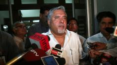 Kingfisher Airlines Chairman Vijay Mallya speaks with the media after his meeting with Director General of Civil Aviation E.K. Bharat Bhushan in New Delhi March 20, 2012. REUTERS/Parivartan Sharma 
