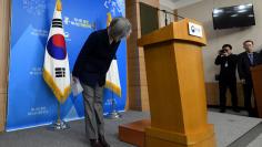 South Korea's Foreign Minister Kang Kyung-Wha bows during a briefing on the 2015 South Korea-Japan agreement over South Korea's "comfort women" issue at the Foreign Ministry in Seoul