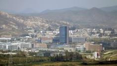 The inter-Korean Kaesong Industrial Complex is seen across the demilitarised zone (DMZ) separating North Korea from South Korea in this picture taken from Dora observatory in Paju, 55 km (34 miles) north of Seoul, September 25, 2013. REUTERS/Lee Jae-Won