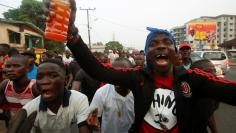 Supporters of George Weah, former soccer player and presidential candidate of Coalition for Democratic Change (CDC), celebrate after the announcement of the presidential election results in Monrovia, Liberia December 28, 2017. REUTERS/Thierry Gouegnon