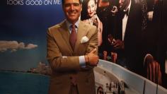 FILE PHOTO: Baha Mar's Chairman and CEO Sarkis Izmirlian poses in front of a counter promoting the Bahamian Riviera resort during the Global Gaming Expo Asia in Macau May 22, 2013. REUTERS/Bobby Yip 