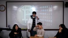 Eoh Kyung-hoon, leader of a club studying cryptocurrencies, attends a meeting at a university in Seoul