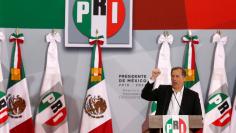 FILE PHOTO: Jose Antonio Meade, former Mexico Finance Minister, delivers a speech to his supporters, after registering as a presidential pre-candidate for the Institutional Revolutionary Party (PRI), in Mexico City