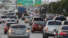 Rush hour traffic is shown on Interstate 95 near downtown Miami, Florida