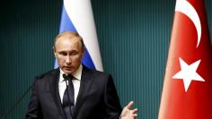 File photo of Russia's President Putin attending a news conference at Presidential Palace in Ankara