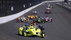 May 26, 2017; Indianapolis, IN, USA; Verizon IndyCar Series driver Simon Pagenaud (1) leads a pack of car down the front straightaway into turn one during Carb Day for the 101st Running of the Indianapolis 500 at Indianapolis Motor Speedway. Mandatory Cr