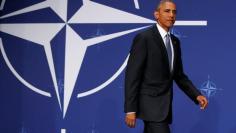 U.S. President Barack Obama begins a news conference after participating in the NATO Summit in Warsaw, Poland July 9, 2016. REUTERS/Jonathan Ernst 