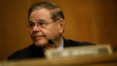 FILE PHOTO: Sen. Bob Menendez (D-NJ) looks on during a Senate Banking Committee hearing on Capitol Hill in Washington, U.S. January 23, 2018. REUTERS/Aaron P. Bernstein/File Photo