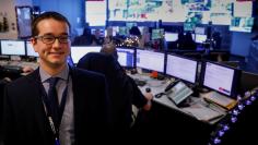 Eliot Calhoun, the Chemical, Biological, Radiological, Nuclear, and Explosives (CBRNE) Planner for NYC Emergency Management, poses in the operations center at the Emergency Management Headquarters in the Brooklyn borough of New York