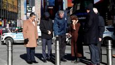 New York City Mayor Bill de Blasio, (C) New York City Department of Transportation Commissioner Polly Trottenberg, NYPD Commissioner James O'Neill (R) and U.S. Congressman Adriano Espaillat (D-NY)  (L) stand near additional bollards on sidewalks and plaz