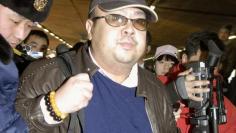 FILE PHOTO - Kim Jong Nam arrives at Beijing airport in Beijing, China, in this photo taken by Kyodo February 11, 2007. Mandatory credit Kyodo/via REUTERS