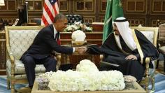 U.S. President Barack Obama (L) shakes hands with Saudi Arabia's King Salman at the start of a bilateral meeting at Erga Palace in Riyadh January 27, 2015. REUTERS/Jim Bourg 