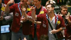 Oil traders work in the pit of the New York Mercantile Exchange in New York